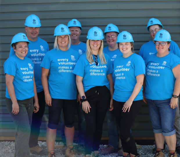 Meridian employees tending the branch community garden in Virgil Ontario